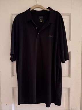 Greg Norman Collection Black Polo with Subtle Multicolor Shark Logo Golf Shirt